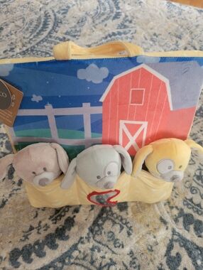 NWT Blue and Yellow Rattle & Play Pals Soft Puppies.